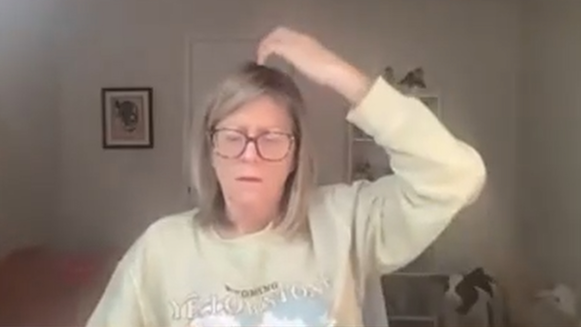 A client doing SFT tapping during one of the Jenuine Healing group SFT tapping events