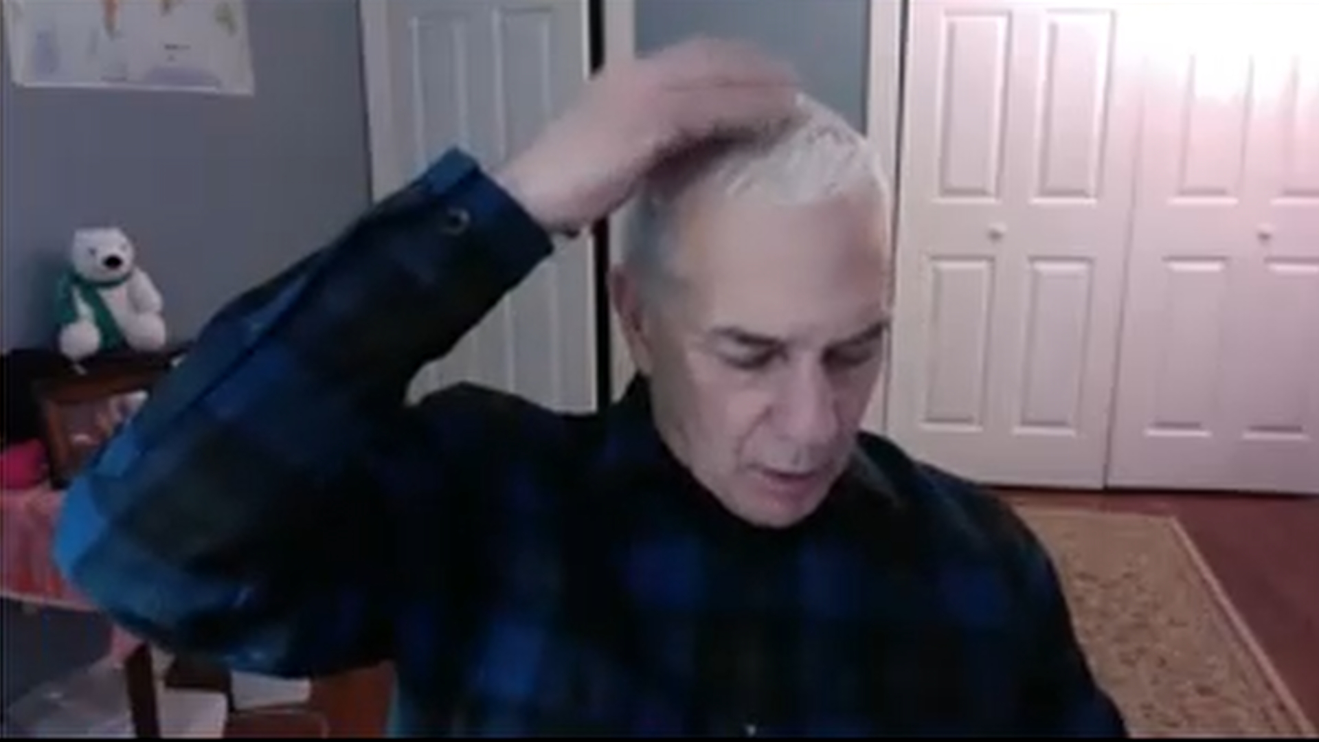 A client doing SFT tapping during one of the Jenuine Healing group SFT tapping events