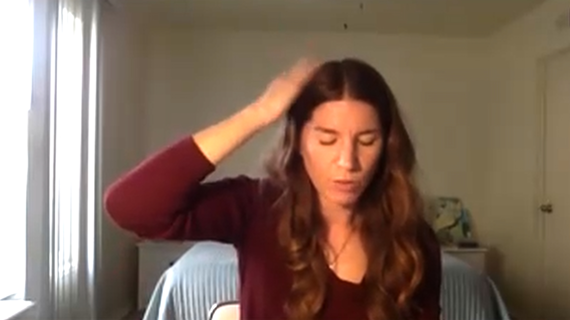 A client doing SFT tapping during one of the Jenuine Healing group SFT tapping events