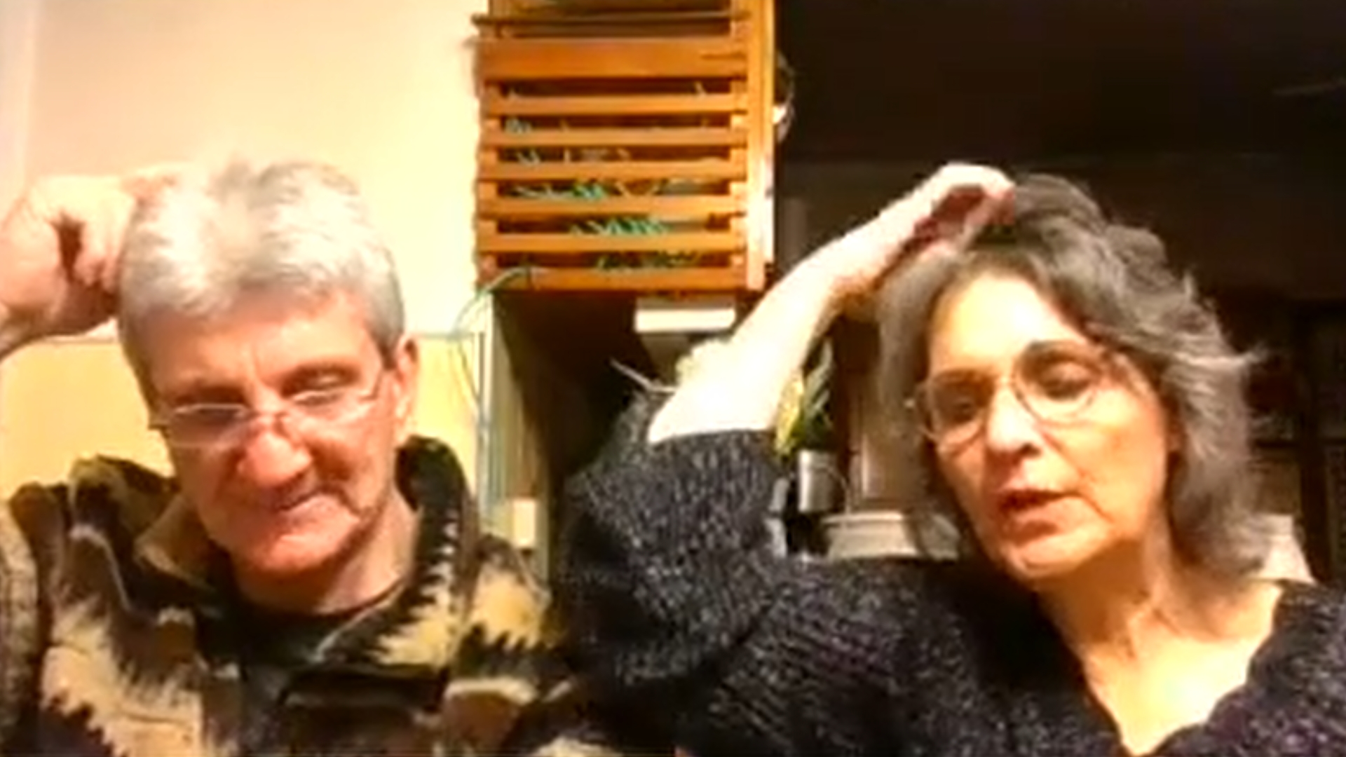 A couple doing SFT tapping during one of the Jenuine Healing group SFT tapping events