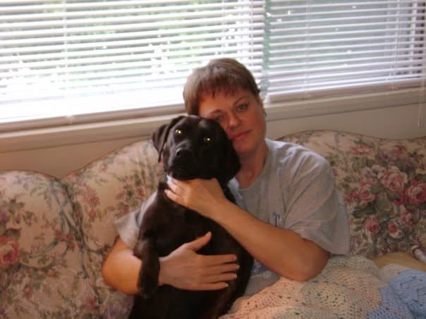 Photo of Jen Ward after returning from the property hugging Simha
